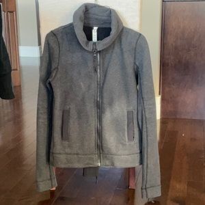 Zip up fleece jacket with zipper detail on back